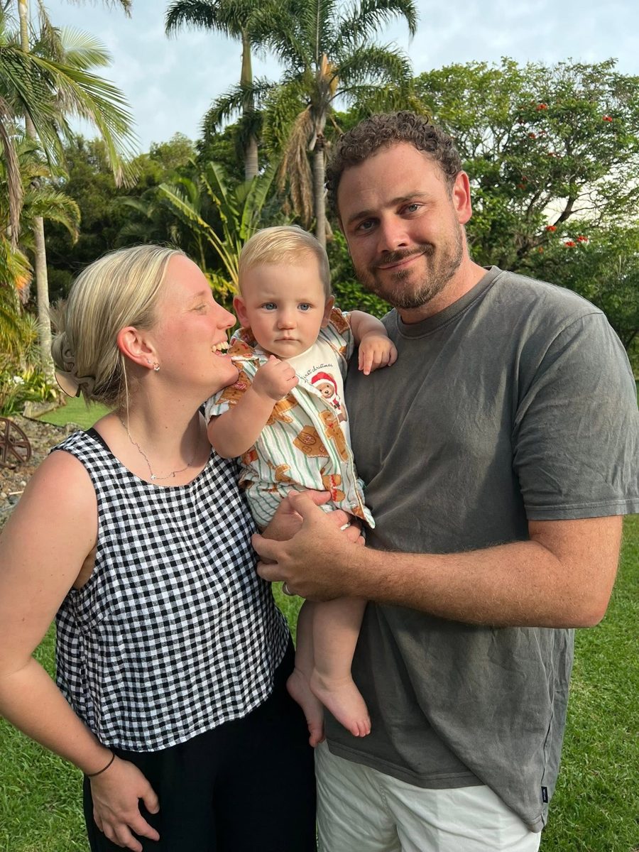 Joshua with his wife Kate and their son